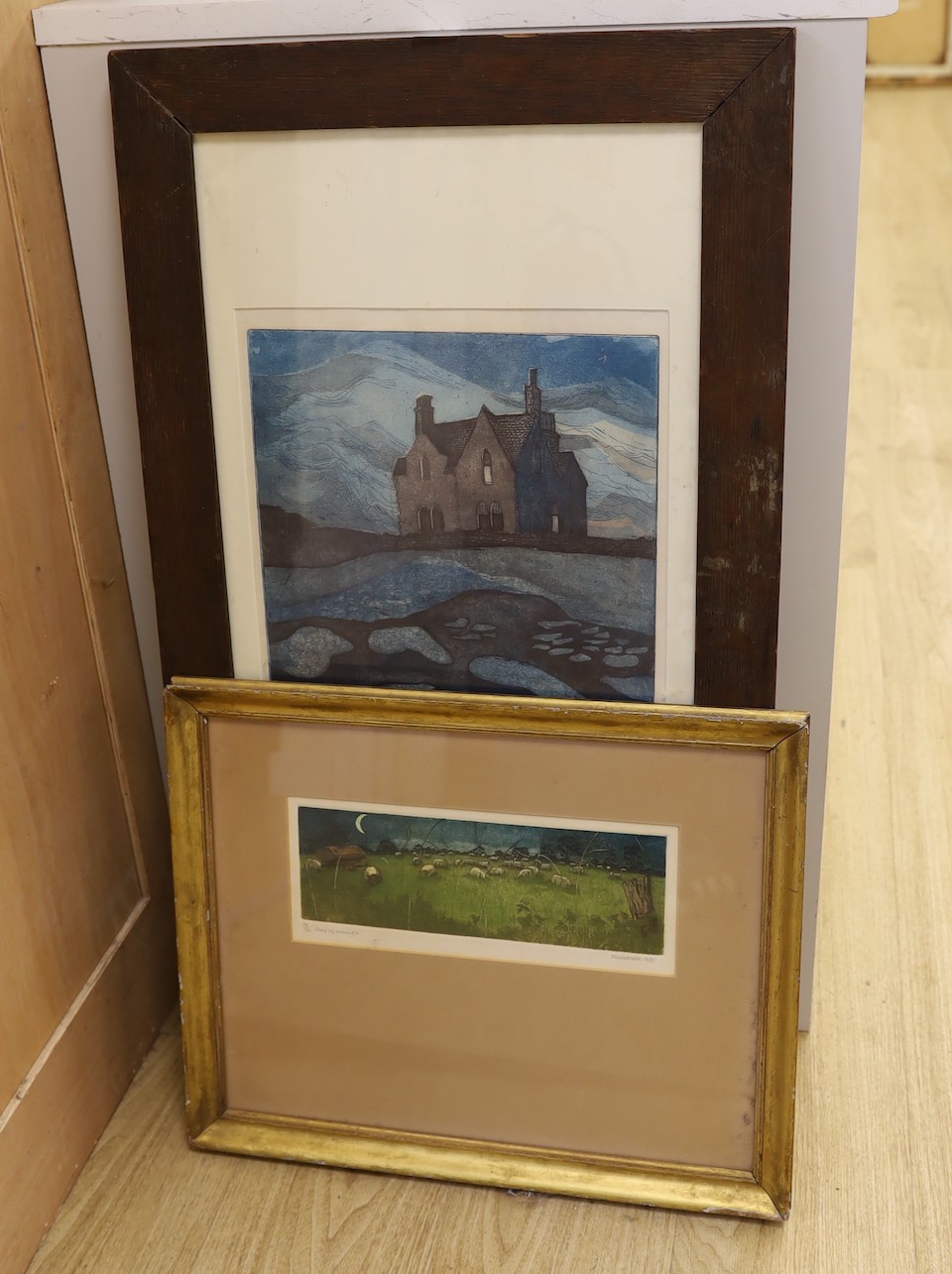 Monica Fenton, etching with aquatint, House beside the sea, 42 x 30cm, and a Richard Wade, print, Sheep by moonlight, 9 x 28cm